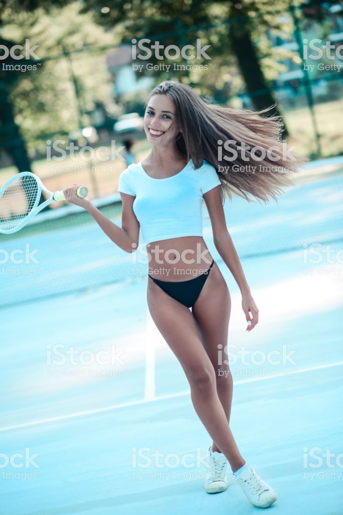 Young women long tennis bikini