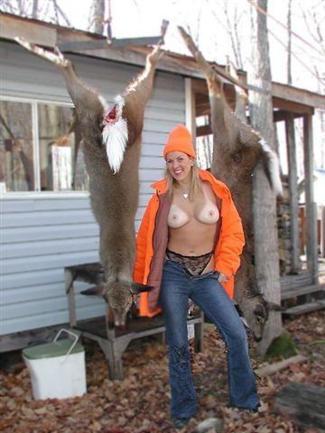 Woman nude in deer stand