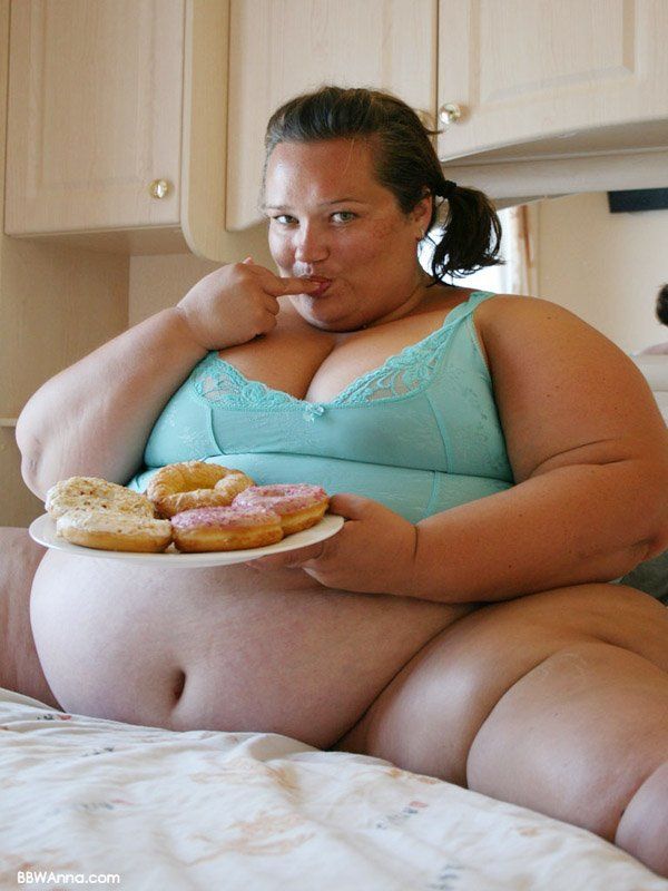 Fat girl eating naked