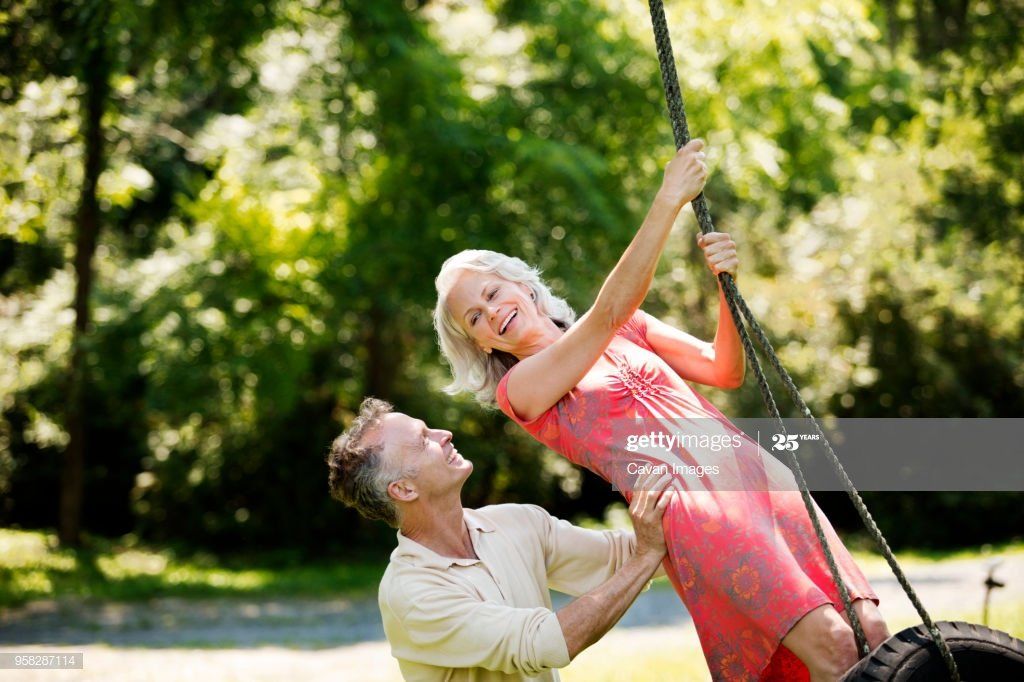 Senior couples swinging