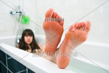 Redhead in bath tub