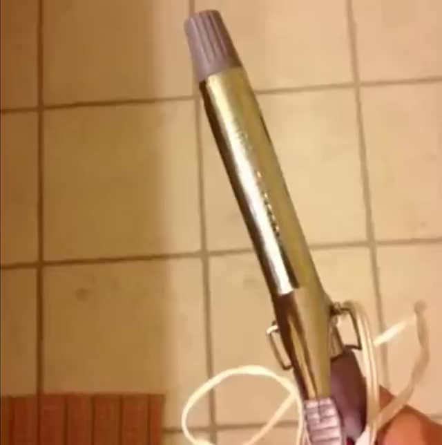 Curling iron in pussy