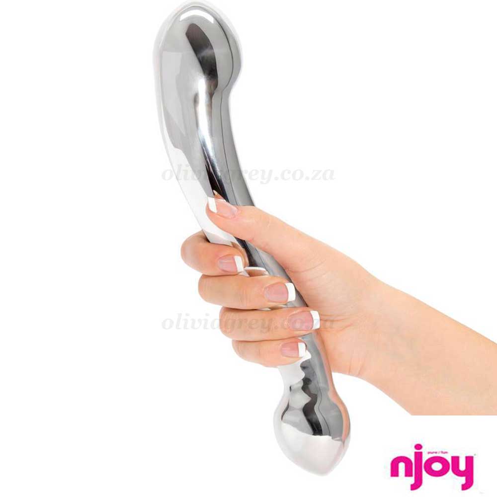 Playing with a metal dildo at home